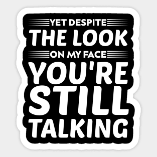 yet despite the look on my face you're still talking humor Sticker